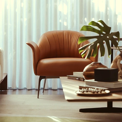 Luxo e Sofisticação: Elevato Casa chega ao site da Elevato 2 Poltrona de luxo em couro caramelo com design sofisticado, disponível na Elevato Casa.